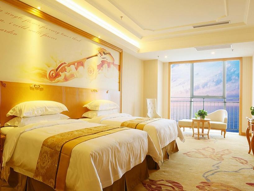 Vienna International Hotel Yantai Changjiang Road Xingyi Square Branch Exteriör bild