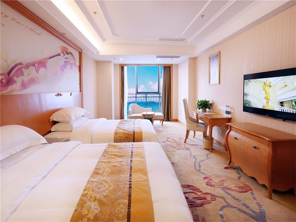 Vienna International Hotel Yantai Changjiang Road Xingyi Square Branch Exteriör bild